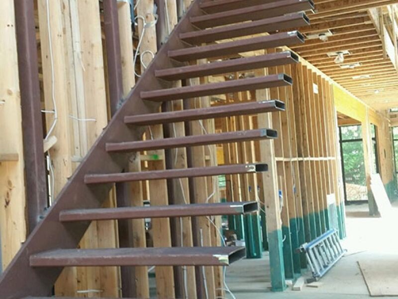 Floating metal stair frame